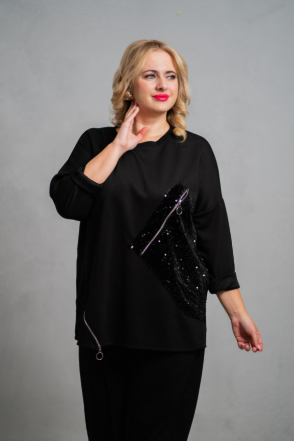 Stylowa bluzka z ozdobnymi suwakami i cekinową aplikacją