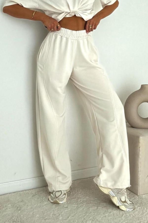 Bawełniane spodnie dresowe ze ściągaczem iferno kremowe