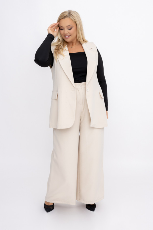 Jasnobeżowe spodnie eleganckie z dżetami deligo