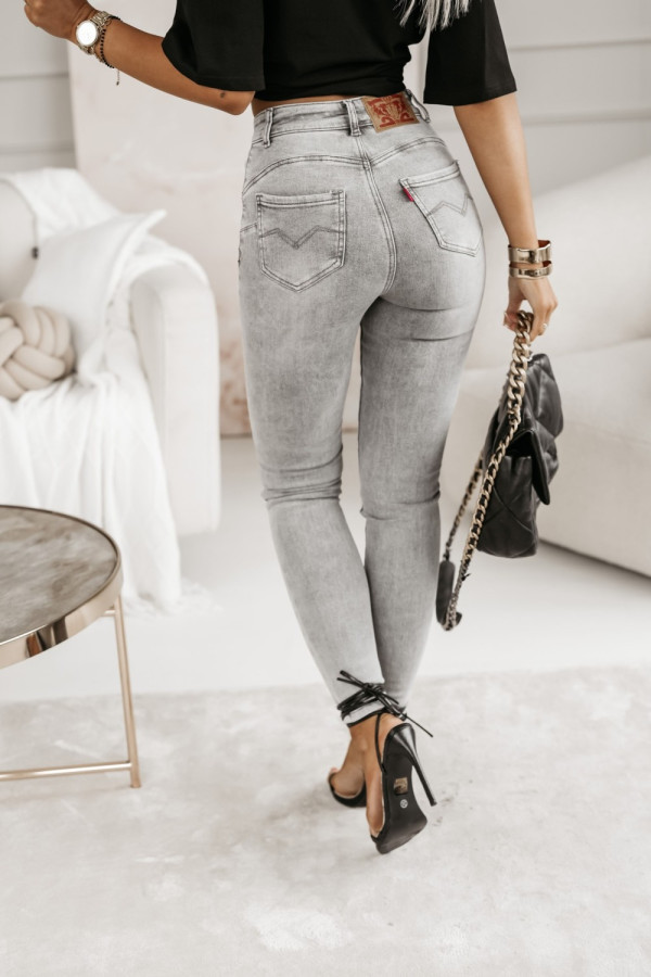 Spodnie jeansowe typu push up z przeszyciami na tylnych kieszeniach grafitowy jeans