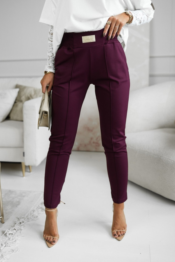 Spodnie materiałowe w kant z gumą w pasie jagodowe